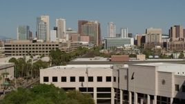 5.7K aerial stock footage of a view of towering office buildings, seen from Supreme Court in Downtown Phoenix, Arizona Aerial Stock Footage | DX0002_137_069