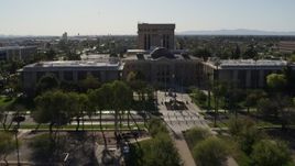 5.7K aerial stock footage reverse view of the Arizona State Capitol in Phoenix, Arizona Aerial Stock Footage | DX0002_138_007