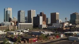 5.7K aerial stock footage reverse view of the city's high-rise office buildings in Downtown Phoenix, Arizona Aerial Stock Footage | DX0002_138_010