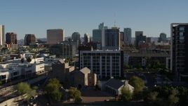 5.7K aerial stock footage of cultural center and hotel with high-rise office buildings in background in Downtown Phoenix, Arizona Aerial Stock Footage | DX0002_138_016
