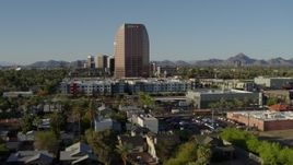 5.7K aerial stock footage of a wide orbit of the BMO Tower high-rise office building in Phoenix, Arizona Aerial Stock Footage | DX0002_138_029