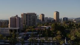 5.7K aerial stock footage of passing by high-rise apartment buildings, focus on office buildings in Phoenix, Arizona Aerial Stock Footage | DX0002_138_038