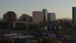 5.7K aerial stock footage of a hotel and high-rise office buildings at sunset in Downtown Phoenix, Arizona Aerial Stock Footage | DX0002_138_045