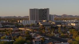 5.7K aerial stock footage of a hospital complex at sunset in Phoenix, Arizona Aerial Stock Footage | DX0002_138_055