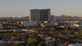5.7K aerial stock footage of orbiting a hospital complex at sunset in Phoenix, Arizona Aerial Stock Footage | DX0002_138_056
