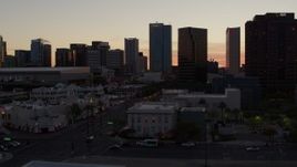 5.7K aerial stock footage of tall office buildings at sunset in Downtown Phoenix, Arizona Aerial Stock Footage | DX0002_139_004