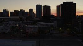 5.7K aerial stock footage of approaching tall office high-rises at sunset in Downtown Phoenix, Arizona Aerial Stock Footage | DX0002_139_011
