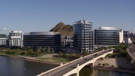 5.7K aerial stock footage of a reverse view of modern office buildings in Tempe, Arizona Aerial Stock Footage | DX0002_142_002