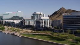 5.7K aerial stock footage of a reverse view of a riverfront condominium complex in Tempe, Arizona Aerial Stock Footage | DX0002_142_005