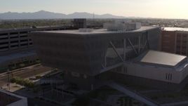 5.7K aerial stock footage of an orbit of the Maricopa County Sheriff’s Office building at sunset in Downtown Phoenix, Arizona Aerial Stock Footage | DX0002_142_034