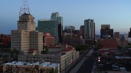 5.7K aerial stock footage of towering office buildings, orbit Westward Ho building at twilight, Downtown Phoenix, Arizona Aerial Stock Footage | DX0002_143_054