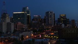 5.7K aerial stock footage approach and flyby high-rise office buildings near Westward Ho building at twilight, Downtown Phoenix, Arizona Aerial Stock Footage | DX0002_143_063