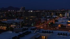 5.7K aerial stock footage of circling a glass office building at twilight, Downtown Phoenix, Arizona Aerial Stock Footage | DX0002_143_066