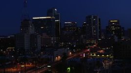 5.7K aerial stock footage flyby Westward Ho building to approach high-rise office buildings at twilight, Downtown Phoenix, Arizona Aerial Stock Footage | DX0002_143_068
