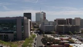 5.7K aerial stock footage fly past courthouse, ascend and orbit tall high-rise office buildings, Downtown Tucson, Arizona Aerial Stock Footage | DX0002_144_012