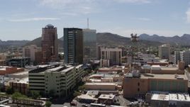 5.7K aerial stock footage descend and orbit high-rise office buildings in Downtown Tucson, Arizona Aerial Stock Footage | DX0002_144_014