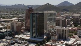 5.7K aerial stock footage orbiting three high-rise office towers, revealing "A" Mountain (Sentinel Peak), Downtown Tucson, Arizona Aerial Stock Footage | DX0002_144_016