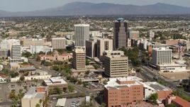 5.7K aerial stock footage of passing by tall high-rise office towers and city buildings in Downtown Tucson, Arizona Aerial Stock Footage | DX0002_144_028