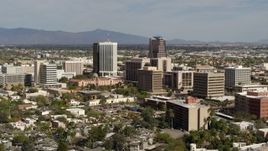 5.7K aerial stock footage of tall high-rise office towers and city buildings while ascending in Downtown Tucson, Arizona Aerial Stock Footage | DX0002_144_031