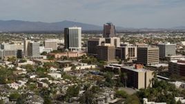 5.7K aerial stock footage of focusing on tall high-rise office towers and city buildings in Downtown Tucson, Arizona Aerial Stock Footage | DX0002_144_032