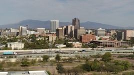 5.7K aerial stock footage of tall office high-rises and city buildings, seen while approaching I-10, Downtown Tucson, Arizona Aerial Stock Footage | DX0002_144_040