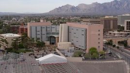 5.7K aerial stock footage of slowly approaching a district court building in Downtown Tucson, Arizona Aerial Stock Footage | DX0002_145_029