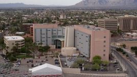 5.7K aerial stock footage of a reverse view of a district court building in Downtown Tucson, Arizona Aerial Stock Footage | DX0002_145_030