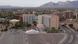 5.7K aerial stock footage approach and orbit a district court building in Downtown Tucson, Arizona Aerial Stock Footage | DX0002_145_031