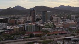 5.7K aerial stock footage descend while orbiting office towers in Downtown Tucson, Arizona Aerial Stock Footage | DX0002_145_042