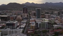 5.7K aerial stock footage descend with view of Congress Street between office towers in Downtown Tucson, Arizona Aerial Stock Footage | DX0002_145_044