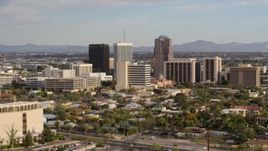 5.7K aerial stock footage three office towers while ascending in Downtown Tucson, Arizona Aerial Stock Footage | DX0002_146_001