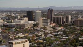 5.7K aerial stock footage flyby and then approach three office towers in the middle of Downtown Tucson, Arizona Aerial Stock Footage | DX0002_146_003