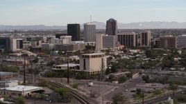 5.7K aerial stock footage approach three office towers behind university office building in Downtown Tucson, Arizona Aerial Stock Footage | DX0002_146_007