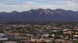 5.7K aerial stock footage of the Santa Catalina Mountains seen from Tucson, Arizona Aerial Stock Footage | DX0002_146_011