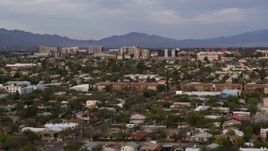 5.7K aerial stock footage of university buildings behind residential neighborhood, Tucson, Arizona Aerial Stock Footage | DX0002_146_013
