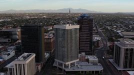 5.7K aerial stock footage orbit and fly away from Bank of America Plaza office tower in Downtown Tucson, Arizona Aerial Stock Footage | DX0002_146_024