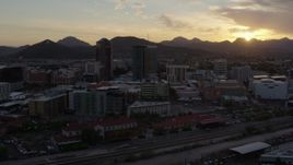 5.7K aerial stock footage of three office towers at sunset in Downtown Tucson, Arizona Aerial Stock Footage | DX0002_146_027