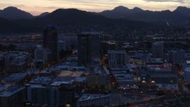5.7K aerial stock footage slowly approach and flyby tall office towers at sunset, Downtown Tucson, Arizona Aerial Stock Footage | DX0002_147_022