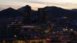 5.7K aerial stock footage slowly circling tall office towers at sunset, Downtown Tucson, Arizona Aerial Stock Footage | DX0002_147_026