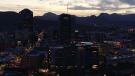 5.7K aerial stock footage orbiting tall office towers at sunset, Downtown Tucson, Arizona Aerial Stock Footage | DX0002_147_027