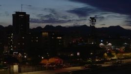5.7K aerial stock footage flyby tower and tall office buildings at twilight, Downtown Tucson, Arizona Aerial Stock Footage | DX0002_147_040