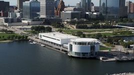 5.7K aerial stock footage of descending near Discovery World museum in Downtown Milwaukee, Wisconsin Aerial Stock Footage | DX0002_149_011