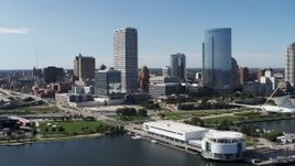 5.7K aerial stock footage of city buildings near the waterfront museum in Downtown Milwaukee, Wisconsin Aerial Stock Footage | DX0002_149_021