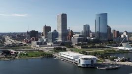 5.7K aerial stock footage descend with a view of city buildings near the waterfront museum in Downtown Milwaukee, Wisconsin Aerial Stock Footage | DX0002_149_022