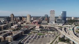 5.7K aerial stock footage of flying away from the city's skyline in Downtown Milwaukee, Wisconsin Aerial Stock Footage | DX0002_149_040