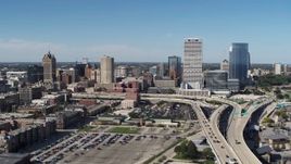 5.7K aerial stock footage of a reverse view of the city's skyline and I-794 in Downtown Milwaukee, Wisconsin Aerial Stock Footage | DX0002_149_042