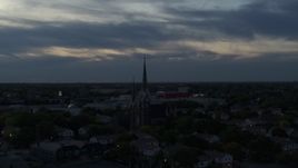 5.7K aerial stock footage of a view of church steeples at twilight, Milwaukee, Wisconsin Aerial Stock Footage | DX0002_150_035