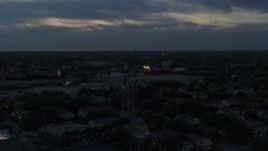 5.7K aerial stock footage of ascending away from church steeples at twilight, Milwaukee, Wisconsin Aerial Stock Footage | DX0002_150_036