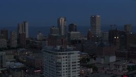 5.7K aerial stock footage a view of Downtown Milwaukee, Wisconsin at twilight Aerial Stock Footage | DX0002_150_037