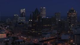 5.7K aerial stock footage of a riverfront office tower at night, Downtown Milwaukee, Wisconsin Aerial Stock Footage | DX0002_151_002